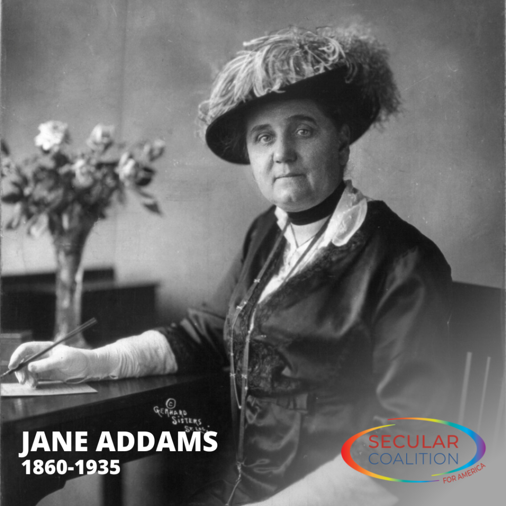 Black and white photo of Jane Addams with her name and "1860-1935" in the bottom left corner, and the SCA Pride rainbow logo in the bottom right corner.